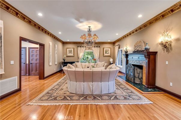 Chandelier, Fireplace, Interior, Living room, Recessed Lighting, Wood Texture Flooring