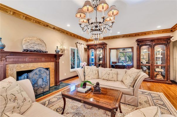 Chandelier, Fireplace, Interior, Living room, Recessed Lighting, Wood Texture Flooring