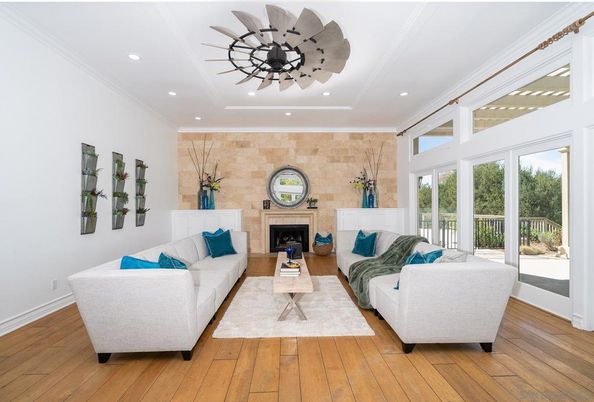Fireplace, Interior, Living room, Recessed Lighting, Stone Walls, Wood Texture Flooring