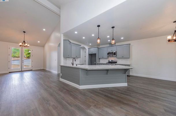 Interior, Kitchen, Pendant Lights, Recessed Lighting, Stainless Steel Appliances, Wood Texture Flooring