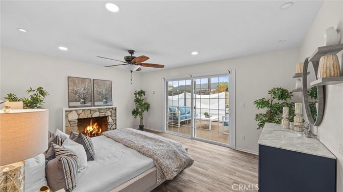Bedroom, Fireplace, Interior, Recessed Lighting, Wood Texture Flooring