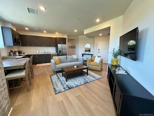 Dining room, Interior, Kitchen, Living room, Recessed Lighting, Stainless Steel Appliances, Wood Texture Flooring