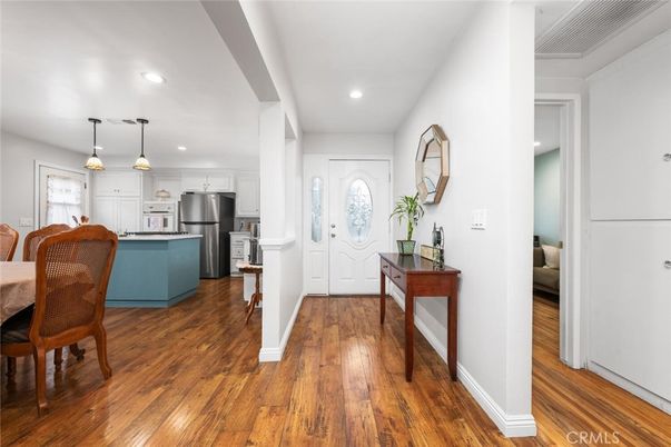 Dining room, Interior, Kitchen, Pendant Lights, Recessed Lighting, Stainless Steel Appliances, Wood Texture Flooring