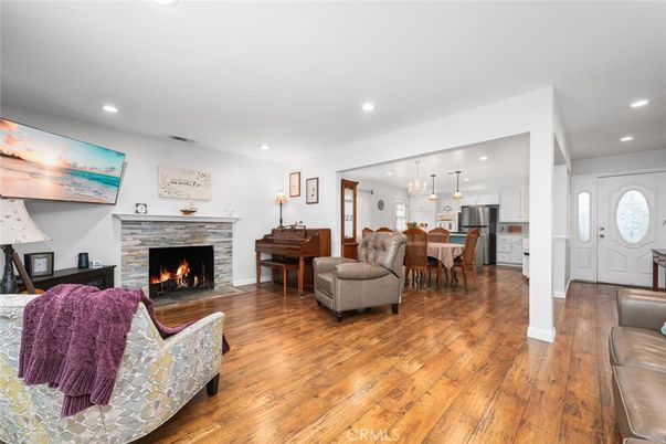 Dining room, Fireplace, Interior, Kitchen, Living room, Pendant Lights, Piano, Recessed Lighting, Wood Texture Flooring