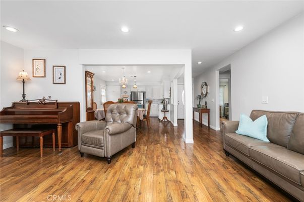 Dining room, Interior, Kitchen, Pendant Lights, Piano, Recessed Lighting, Stainless Steel Appliances, Wood Texture Flooring