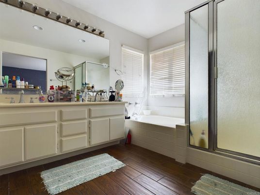 Bathroom, Dual Sink Vanities, Interior, Recessed Lighting, Wood Texture Flooring
