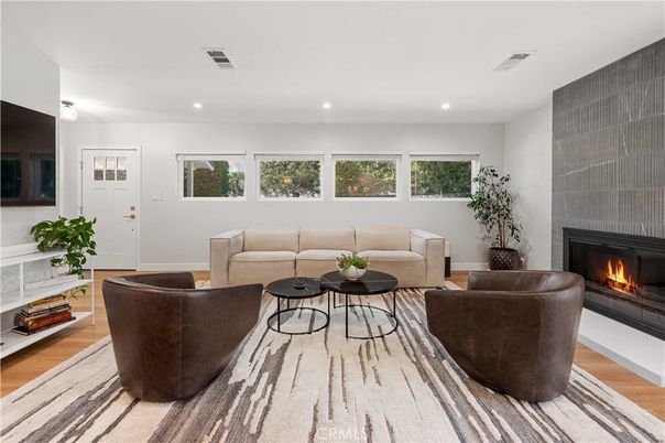 Fireplace, Interior, Living room, Recessed Lighting, Wood Texture Flooring