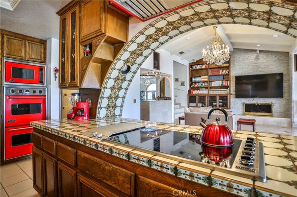 Chandelier, Fireplace, Interior, Kitchen, Recessed Lighting, Tile Countertops