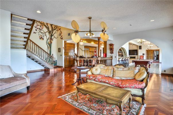 Billiard Table, Chandelier, Dining room, Game Room, Interior, Living room, Recessed Lighting, Wood Texture Flooring