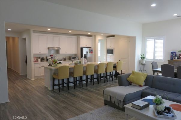 Dining room, Interior, Kitchen, Recessed Lighting, Stainless Steel Appliances, Wood Texture Flooring