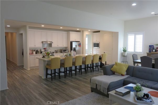 Dining room, Interior, Kitchen, Recessed Lighting, Stainless Steel Appliances, Wood Texture Flooring