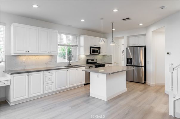 Interior, Kitchen, Pendant Lights, Recessed Lighting, Stainless Steel Appliances, Wood Texture Flooring