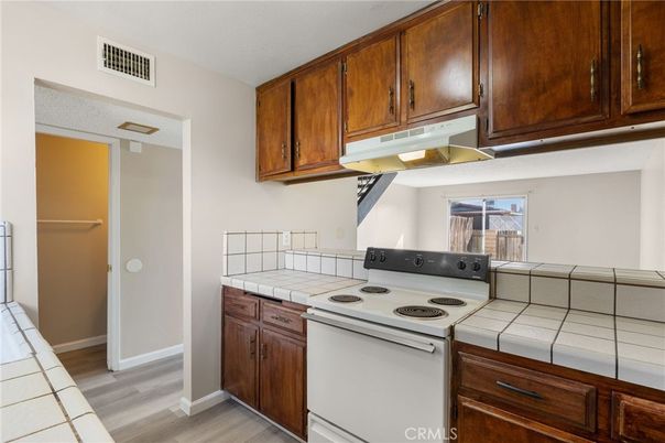 Interior, Kitchen, Tile Countertops, Wood Texture Flooring