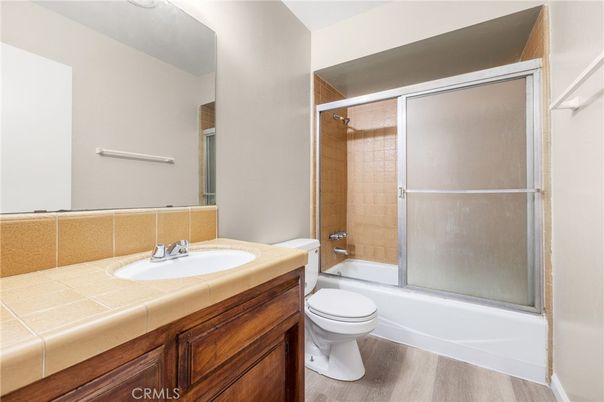 Bathroom, Glass Shower, Interior, Tile Countertops, Wood Texture Flooring