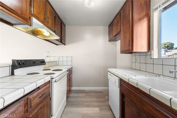 Interior, Kitchen, Tile Countertops, Wood Texture Flooring