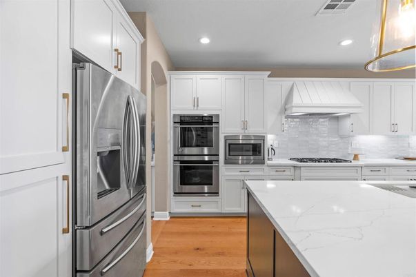 Interior, Kitchen, Recessed Lighting, Stainless Steel Appliances, Wood Texture Flooring