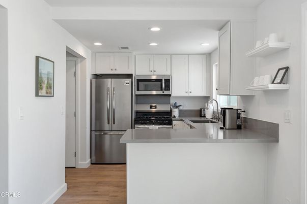 Interior, Kitchen, Recessed Lighting, Stainless Steel Appliances, Wood Texture Flooring