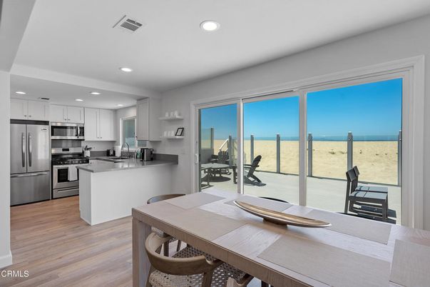 Dining room, Interior, Kitchen, Recessed Lighting, Stainless Steel Appliances, Wood Texture Flooring