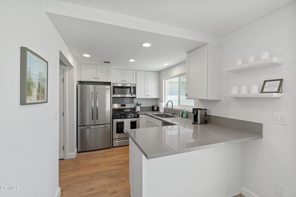 Interior, Kitchen, Recessed Lighting, Stainless Steel Appliances, Wood Texture Flooring