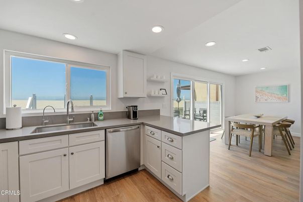 Dining room, Interior, Kitchen, Recessed Lighting, Stainless Steel Appliances, Wood Texture Flooring