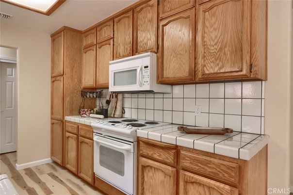 Interior, Kitchen, Tile Countertops, Wood Texture Flooring