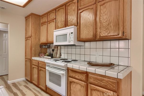Interior, Kitchen, Tile Countertops, Wood Texture Flooring