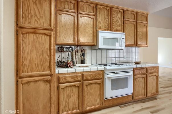 Interior, Kitchen, Tile Countertops, Wood Texture Flooring