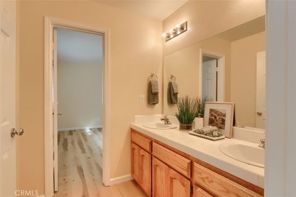 Bathroom, Dual Sink Vanities, Interior, Tile Countertops, Wood Texture Flooring