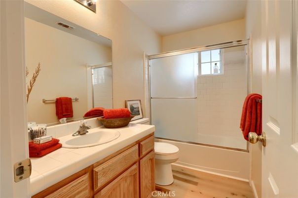 Bathroom, Glass Shower, Interior, Tile Countertops, Wood Texture Flooring