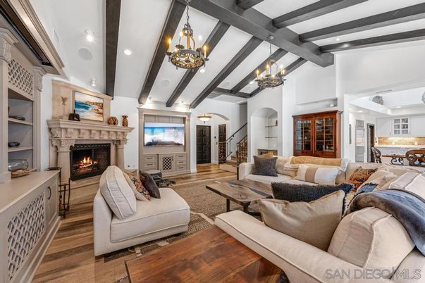 Chandelier, Dining room, Fireplace, Interior, Living room, Recessed Lighting, Wooden Beams, Wood Texture Flooring