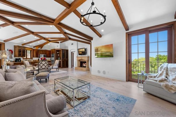 Chandelier, Dining room, Fireplace, Interior, Living room, Pendant Lights, Recessed Lighting, Wooden Beams, Wood Texture Flooring