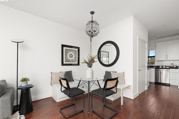 Dining room, Interior, Kitchen, Pendant Lights, Recessed Lighting, Stainless Steel Appliances, Wood Texture Flooring