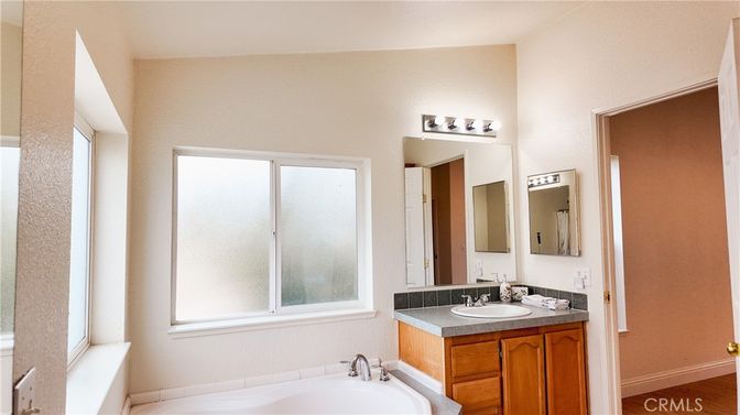 Bathroom, Dual Sink Vanities, Interior, Tile Countertops, Wood Texture Flooring