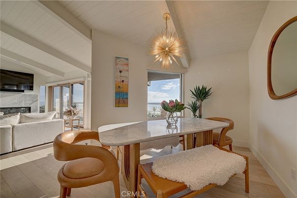 Dining room, Fireplace, Interior, Living room, Pendant Lights, Water, Wood Texture Flooring