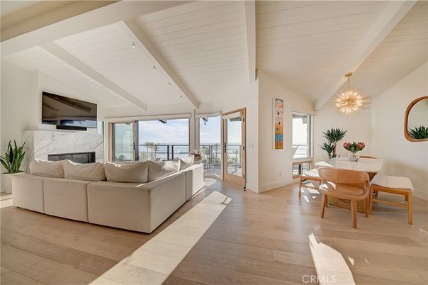 Dining room, Fireplace, Interior, Living room, Pendant Lights, Water, Wood Texture Flooring