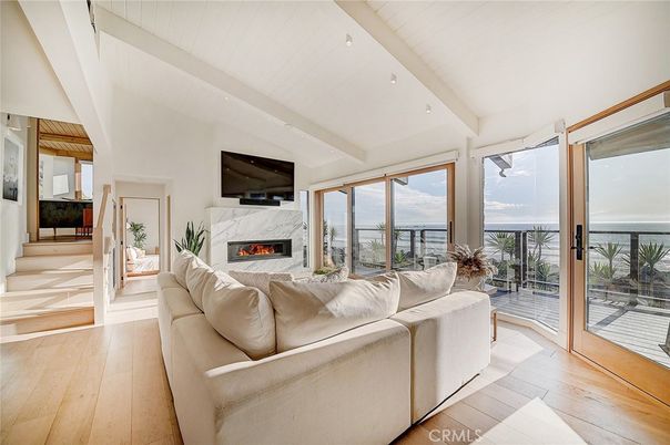 Fireplace, Interior, Living room, Recessed Lighting, Water, Wood Texture Flooring