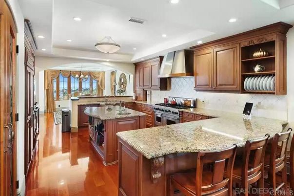 Chandelier, Dining room, Interior, Kitchen, Recessed Lighting, Stainless Steel Appliances, Wood Texture Flooring