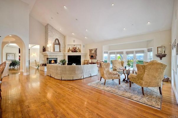 Fireplace, Interior, Living room, Recessed Lighting, Stone Walls, Wood Texture Flooring