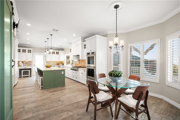 Dining room, Interior, Kitchen, Pendant Lights, Recessed Lighting, Stainless Steel Appliances, Wood Texture Flooring