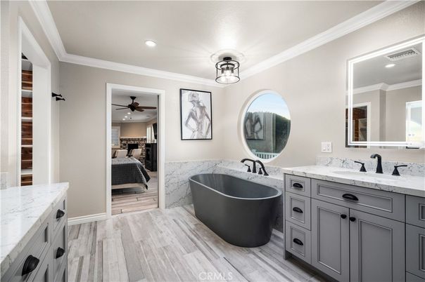 Bathroom, Bedroom, Dual Sink Vanities, Free Standing Baths, Interior, Recessed Lighting, Wood Texture Flooring