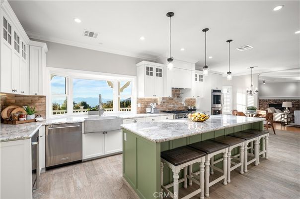 Dining room, Interior, Kitchen, Pendant Lights, Recessed Lighting, Stainless Steel Appliances, Wood Texture Flooring