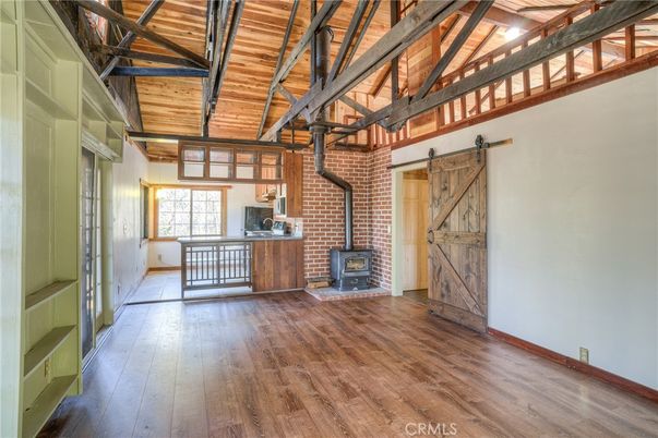 Empty room, Fireplace, Interior, Stone Walls, Wooden Beams, Wooden Ceilings, Wood Texture Flooring
