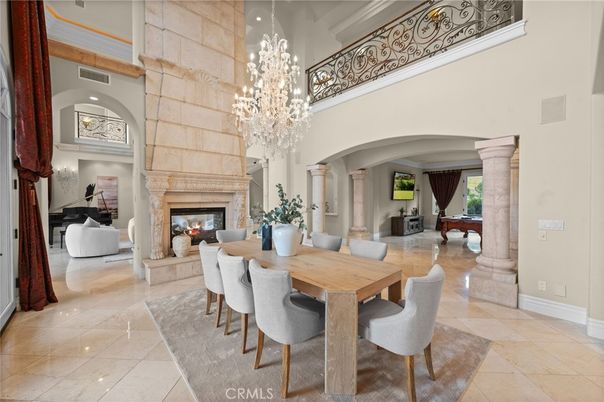 Chandelier, Dining room, Fireplace, Interior, Piano, Recessed Lighting
