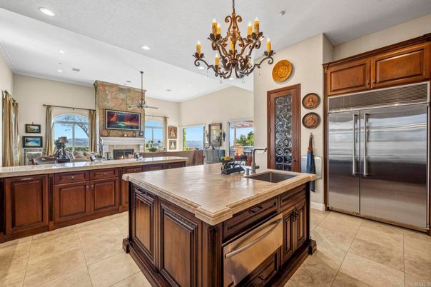 Chandelier, Fireplace, Interior, Kitchen, Recessed Lighting, Stainless Steel Appliances