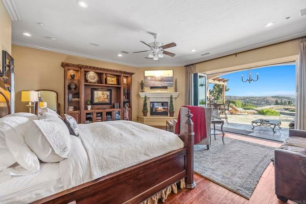 Bedroom, Fireplace, Interior, Recessed Lighting, Wood Texture Flooring
