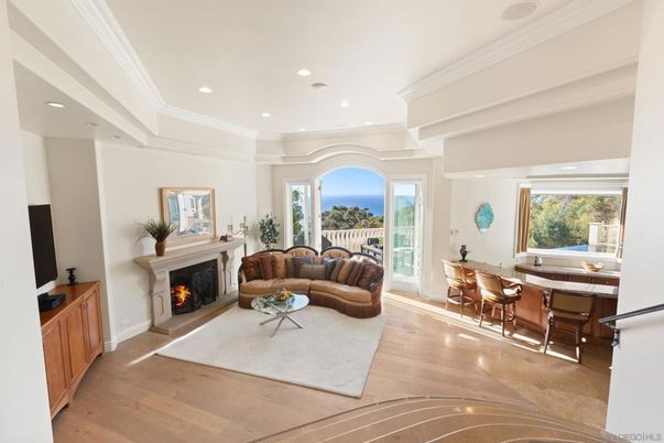 Dining room, Fireplace, Interior, Living room, Recessed Lighting, Water, Wood Texture Flooring