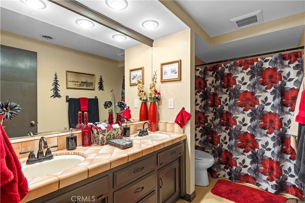 Bathroom, Dual Sink Vanities, Interior, Recessed Lighting, Tile Countertops
