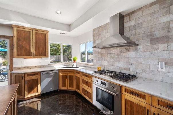 Interior, Kitchen, Recessed Lighting, Stainless Steel Appliances, Stone Walls