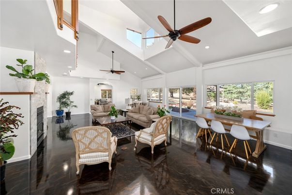 Dining room, Fireplace, Interior, Living room, Recessed Lighting, Wood Texture Flooring