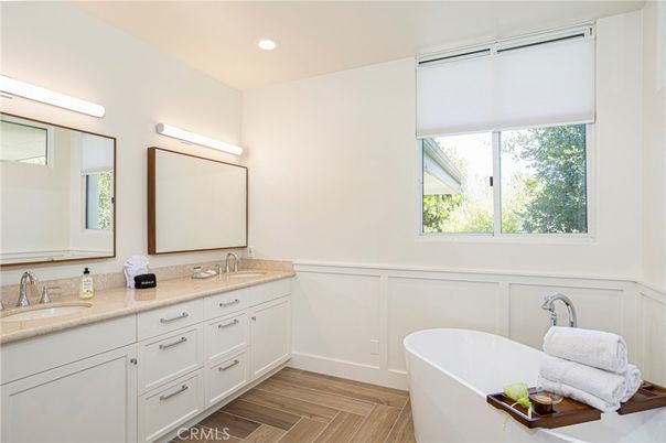 Bathroom, Dual Sink Vanities, Free Standing Baths, Interior, Recessed Lighting, Wood Texture Flooring